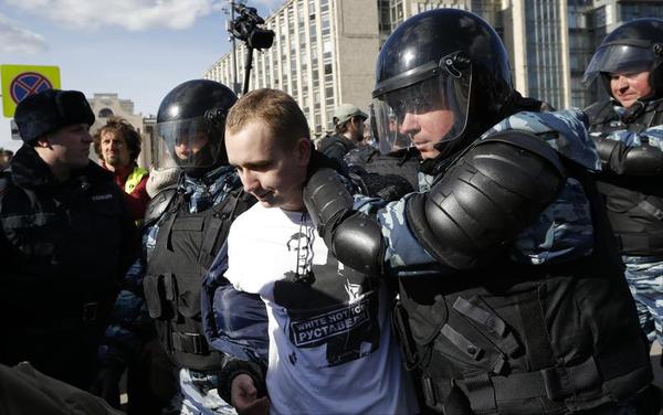 Top Putin Critic Arrested as Protests Flare in Russia