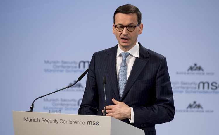 Polish Leader Denies Being a Holocaust Revisionist