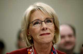 Why Is DeVos Blaming Local Leaders for Following Rules?