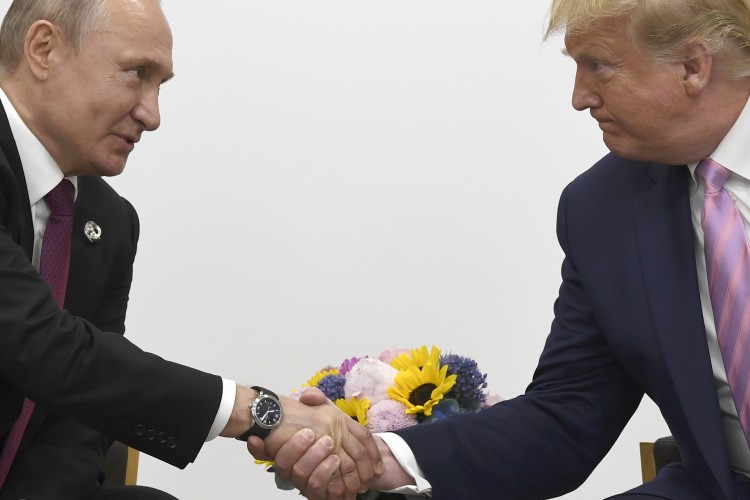 Donald Trump, Vladimir Putin AP Photo/Susan Walsh