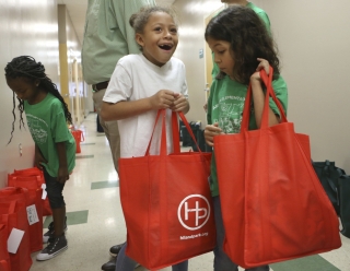 How Gifted Students Improve Outcomes of Classmates