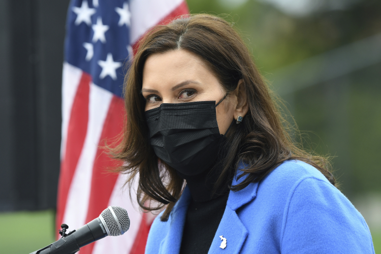 Virus Outbreak Michigan (Lon Horwedel/Detroit News via AP)