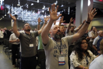 People take part in a worship service during the annual Southern Baptist Convention meeting Tuesday, June 15, 2021, in Nashville, Tenn. (AP Photo/Mark Humphrey)