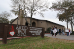 Anti-abortion protesters walk from Sacred Heart Catholic Church Wednesday, Jan. 22, 2014, during a demonstration on the 41st anniversary of the passing of Roe v. Wade, the Supreme Court ruling that struck down anti-abortion laws, Wednesday, Jan. 22, 2014 in Conroe, Texas (AP Photo/Conroe Courier, Jason Fochtman)