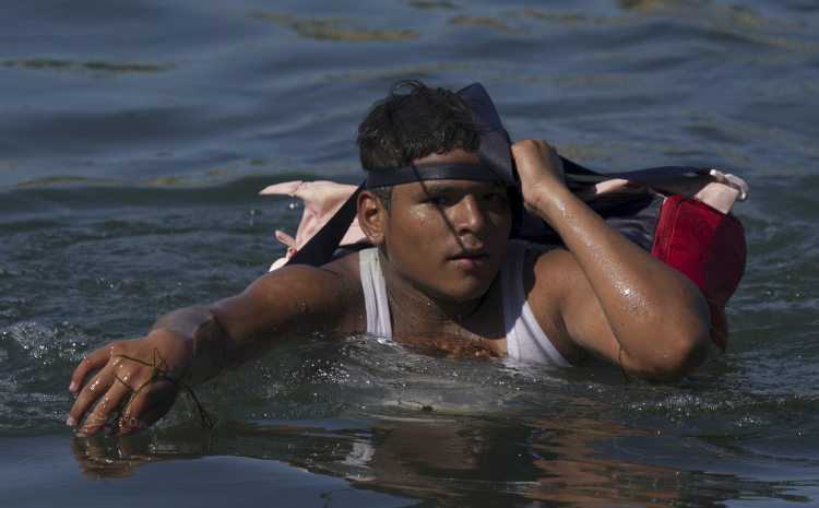 Mexico US Border Migrant Camp (AP Photo/Fernando Llano)