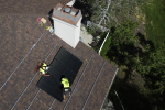 Workman with Power Shift Solar put solar panels on a house Wednesday, Aug. 10, 2022, in Salt Lake City. Congress is poised to pass a transformative climate change fighting bill on Friday, Aug. 12. The crux of the long-delayed bill is to use incentives to spur investors to accelerate the expansion of clean energy such as wind and solar power, speeding the transition away from the oil, coal and gas that largely cause climate change. (AP Photo/Rick Bowmer)
