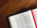 An NRSV Bible open to the first page of Joshua in the Old Testament. .