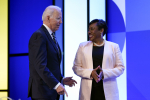 President Joe Biden speaks with National Education Association President Becky Pringle at the NEA's annual meeting at the Walter E. Washington Convention Center in Washington, Friday, July 2, 2021. (AP Photo/Patrick Semansky)