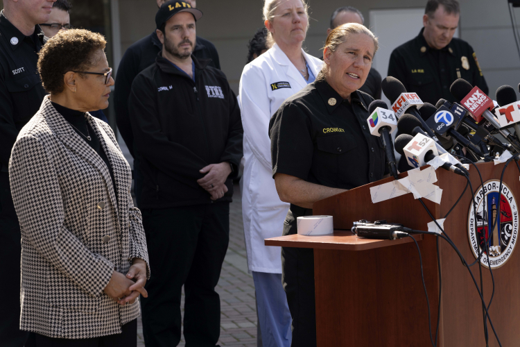 Chief Kristin Crowley, right: AP