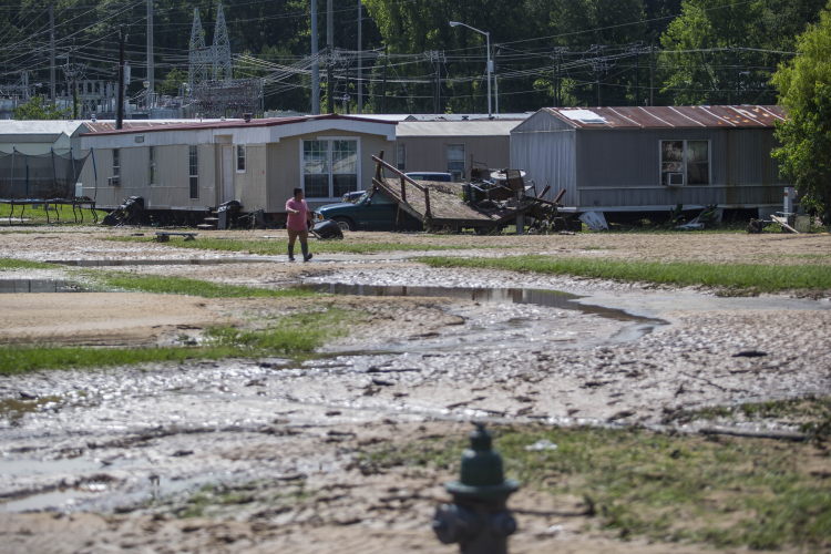 In a town filled small homes and trailer parks, economic relief and rising property values could be a welcome change. FR171624 AP