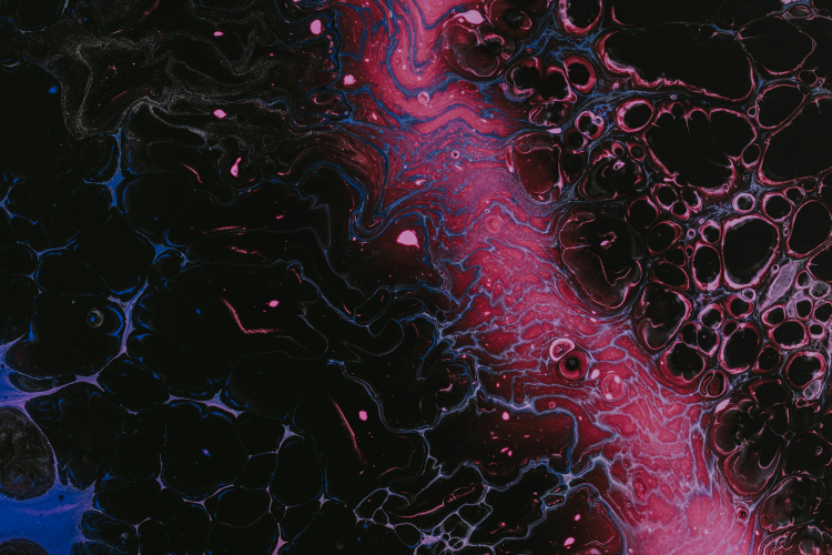 How a Superfluid Simultaneously Becomes a Solid