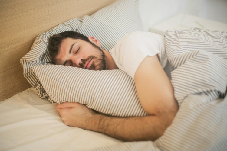The Best Position to Sleep In, According to a Doctor