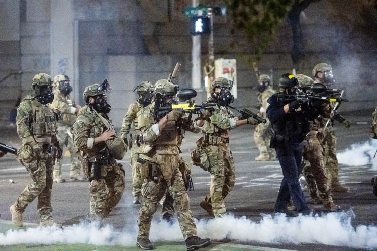 Federal agents use crowd control munitions to disperse Black Lives Matter protesters at the Mark O. Hatfield United States Courthouse on Monday, July 20, 2020, in Portland, FR34727 AP