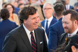 Tucker Plays the Joker to Piers Morgan