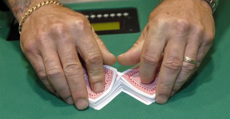 Seven Perfect Shuffles Randomize a Deck of Cards