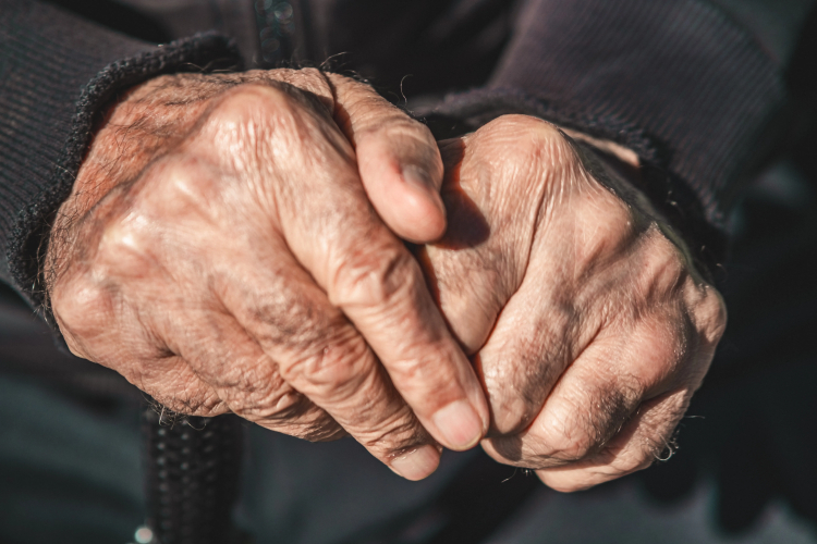 Hyperfunction Theory: A New Perspective on Why We Age