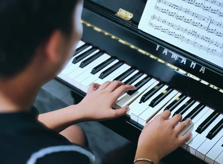 Why Does Music Ease Pain? Researchers Map the Evidence